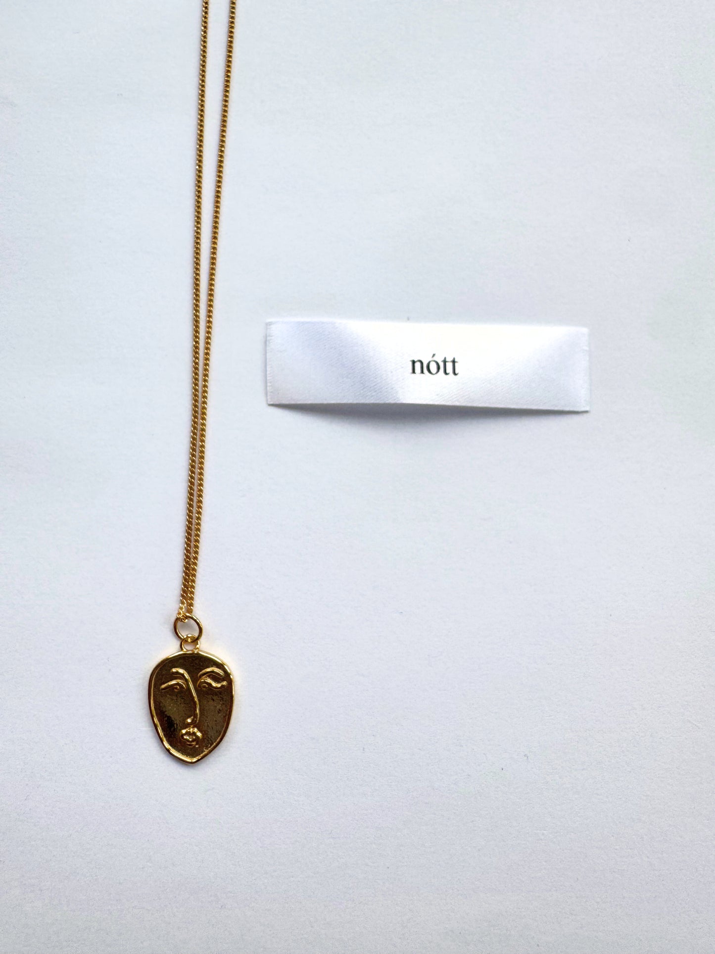 Gold Face Necklace